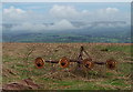 SO0548 : Farm implement left on the open hill by Andrew Hill