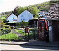 Queen Elizabeth II postbox and a red phonebox, Cwmdu, Powys