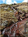 NM8398 : Allt Coire na Cloiche cascades through rocks above the Mam Meadail path by Andy Waddington