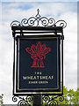 Sign for The Wheatsheaf on the Green, Esher Green