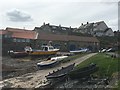 Boats on the shore at Craster