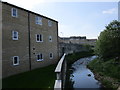 The River Worth and housing on Grove Mill Drive