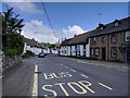 Bus stop in Sticklepath, looking east