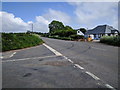 Houses and road junction on the old A30, looking east