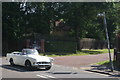 View of a Sunbeam Tiger passing along Court Road