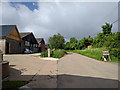 Barns and a sign for Wedding Parking