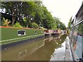 Moored narrowboats on the Ashton Canal