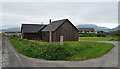 Wooden House at the Road Junction