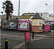 SX8860 : Kiosk and adverts on the approach to Queens Park station, Paignton by Jaggery