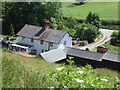 House and bridge seen from Welshpool and Llanfair Light Railway