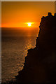 SS7049 : Sunrise behind Castle Rock by Ian Capper