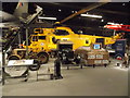 View of an RAF rescue jeep and ZH545 Westland Sea King RAF Search & Rescue helicopter in Hangar 1 in the RAF Museum