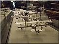 View along a case of model planes in the RAF Museum #2