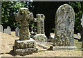 SW7827 : Lichen covered grave stones in Mawnan churchyard by Rod Allday