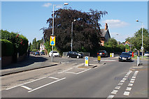 SO8897 : Mini roundabout in Finchfield by Bill Boaden