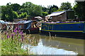 Moored boats on the Grand Union Canal south of Heyford Wharf