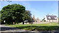 Village green and St John the Baptist Church, Penmaen