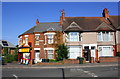 Off licence and houses at north end of Sandy Lane