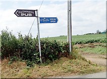 J2207 : A beer or a coffee? Direction signs at Whites Town Cross by Eric Jones