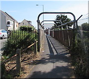 SZ1593 : Tubular footbridge over railway lines, Christchurch by Jaggery
