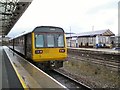 SJ9598 : Huddersfield train at Stalybridge by Gerald England