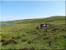 NC7013 : Erratic on the moor above Loch an Eoin by John Ferguson