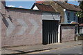 View of chevrons painted on the side of Menagerie Makes from Gaywood Road