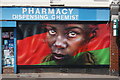 View of a Dale Grimshaw mural on the side of a chemist on Forest Road from Chingford Road #2