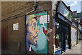 View of street art on the side wall of The Island Spot Carribbean restaurant on Chingford Road