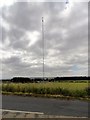 NZ1847 : Burnhope mast from Peth Lane by Robert Graham