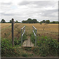 TL6909 : Footbridge and Public Footpath over Recently Harvested Crop Field, Broomfield by Roger Jones
