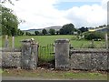 Gateway with a crooked gate on Edenappa Road