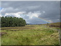 NS9436 : Shallow rainbow near Woodend by Jonathan Thacker