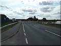 TM0932 : Entering Essex on the A137 The Causeway by Geographer