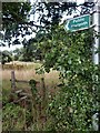 Stile access to an overgrown public footpath