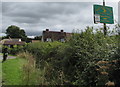 Pen-y-clawdd Farm Fishery direction sign in Coed-y-fedw, Monmouthshire