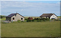 Bungalows on the A964 near Outbrecks