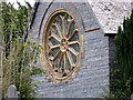 SH7600 : The magnificent rose window of St Cadfarch Church, Penegoes by John Lucas