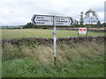 Road sign at the junction of Droverhouse Lane and the B6296