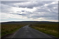 NY8708 : Lonely moorland road. by steven ruffles