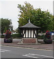 Black & white hut between floral displays, Weston-super-Mare