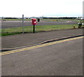 Postbox at the perimeter fence of Gloucestershire Airport, Staverton