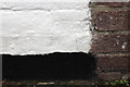 Overpainted benchmark on #1 Grantham Road