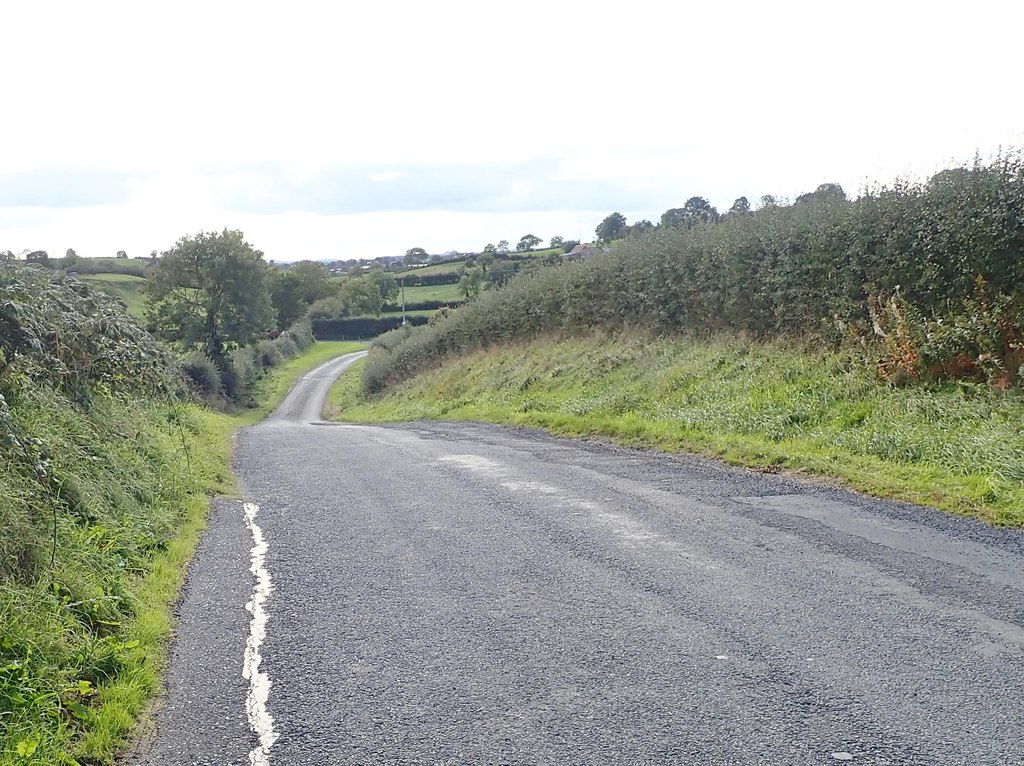 hidden-dip-in-the-lissaraw-road-eric-jones-geograph-ireland