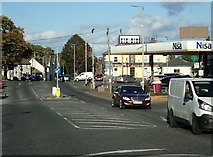 J0326 : The A25 at the centre of the village of Camlough by Eric Jones