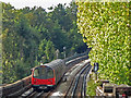 TQ2388 : Northern Line train between Brent Cross and Hendon Central by Mike Quinn