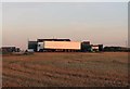 Vehicles and barns by Glebe Farm track