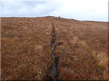 NC7859 : Drainage Ditch and Rock North of Beinn nam Bo by Chris and Meg Mellish