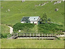 NH1320 : Strawberry Cottage and the bridge by Richard Webb