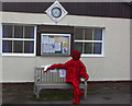 Poppy man outside Monkton Parish council office